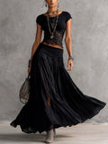 Conjunto elegante con encaje y falda plisada